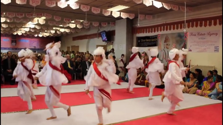 Junior Dandia Raas team performs at the temple