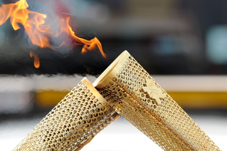 London Olympic 2012 Torch held by Anand Virambhai Khistariya