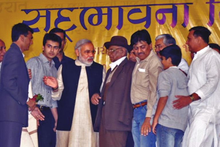 (L-R) Krunal Odedra, Shri Narendra Modi and Shri B. M. Ratiya Saheb at Sadbhavna Mission Junagadh. Karan Ratiya, Shri Sarmanbhai Sutreja, Shri Lakshmanbhai Jadeja and Shri Jethabhai Odedra can also be seen in the photos